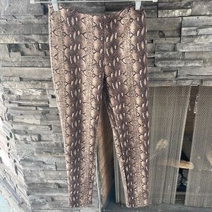 Snakeskin leggings.